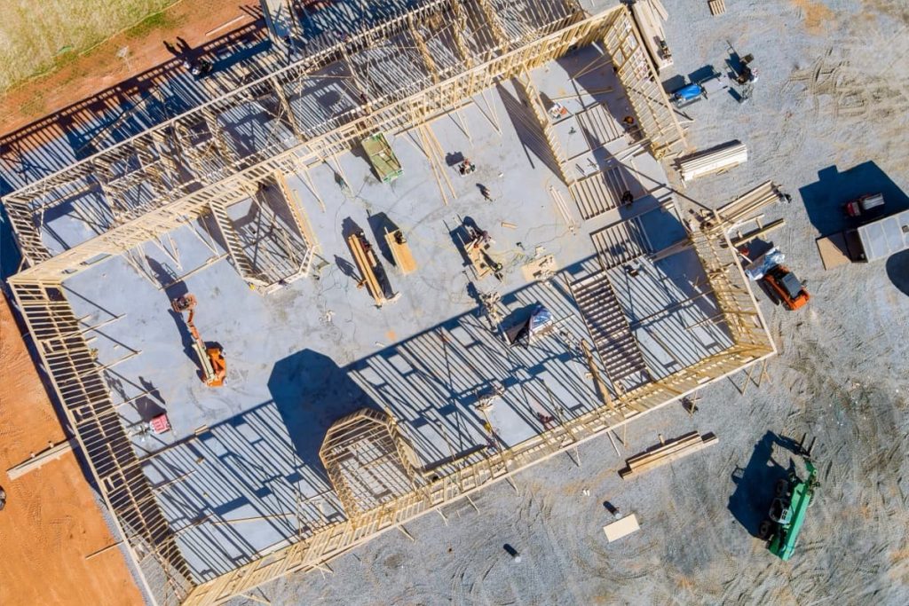 Top aerial view new framing stick built building o 2025 04 01 23 13 09 utc